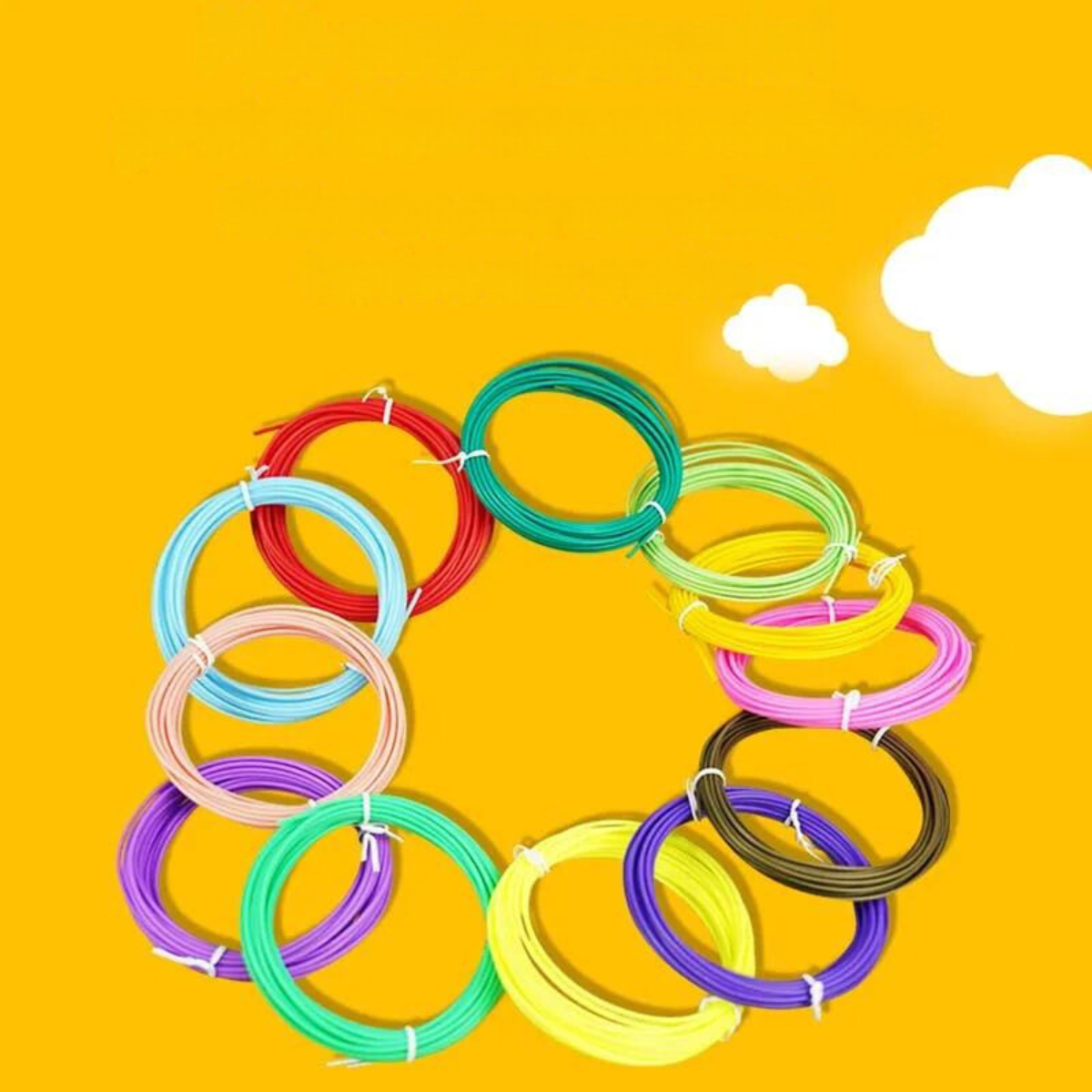 Multiple coils of colorful filament arranged in a circular pattern against a yellow background, used for 3D printing pens.