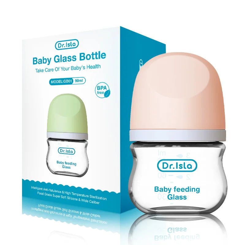 Baby glass bottle with a pink cap, labeled 'Dr. Isla Baby feeding Glass'. The bottle is shown next to its packaging box, which highlights its BPA-free feature and 90ml capacity.