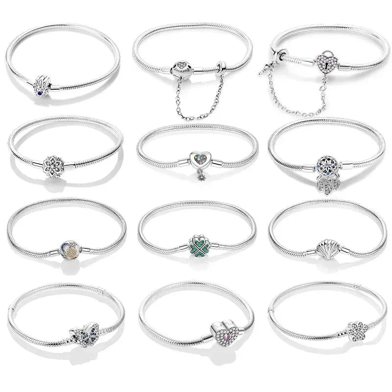 12 different silver bracelets display on white background.
