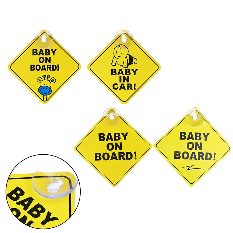 A set of four yellow diamond-shaped signs, each with different "BABY ON BOARD!" or "BABY IN CAR!" messages and illustrations, shown together.